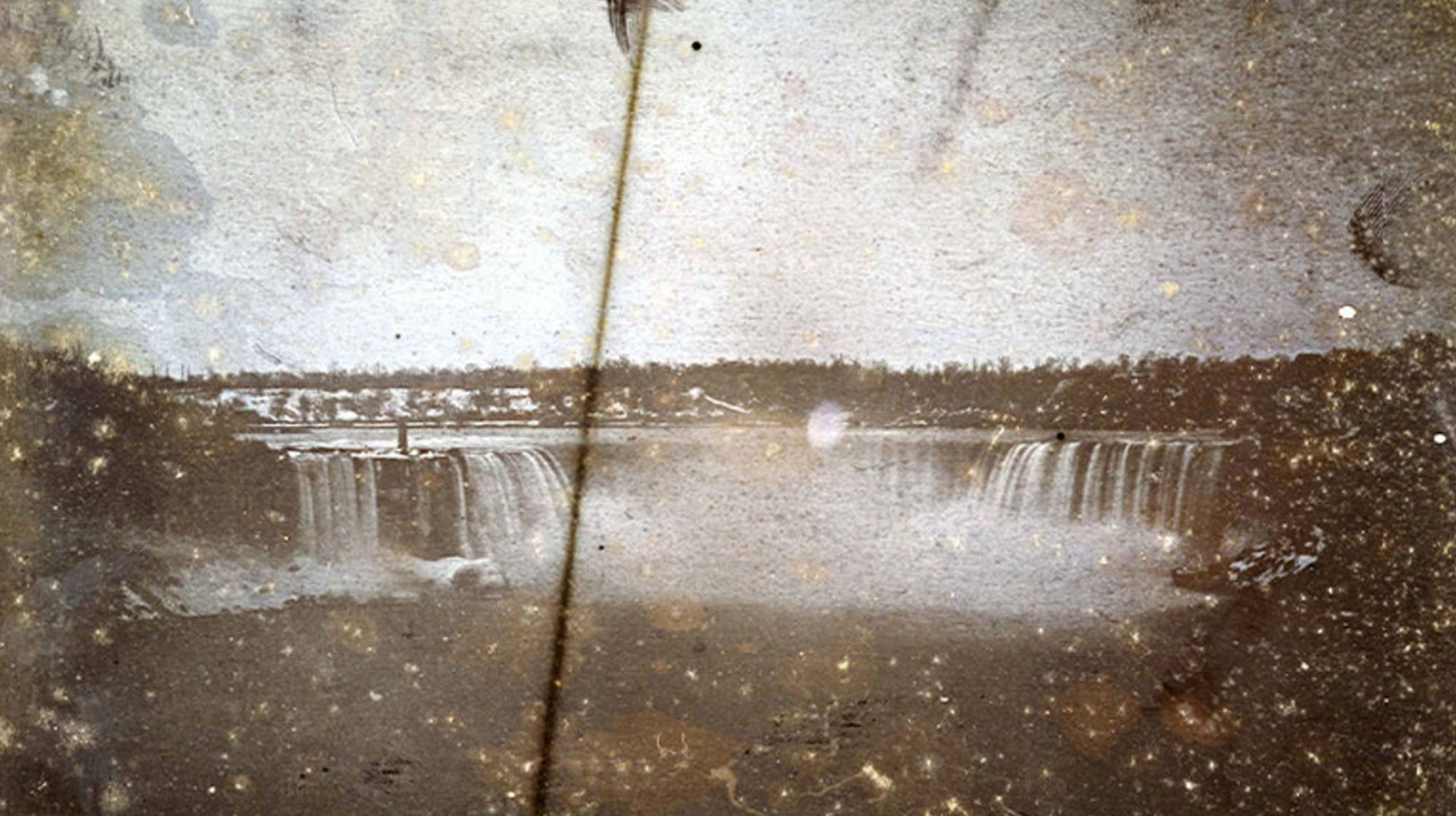 Early photograph of Horseshoe Falls, with some deterioration and spotting to image.